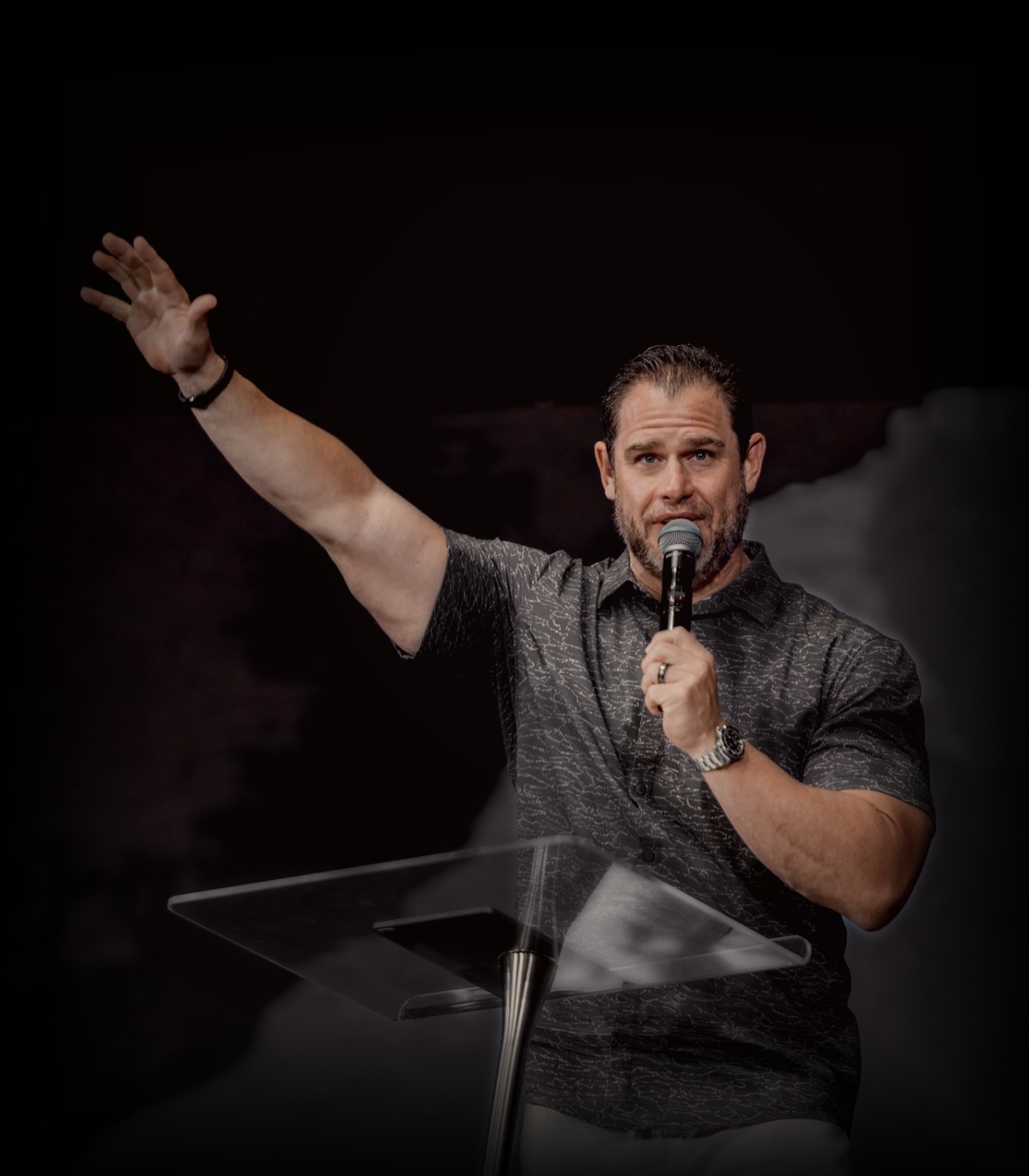 Pastor Joshua Marocco preaching on stage